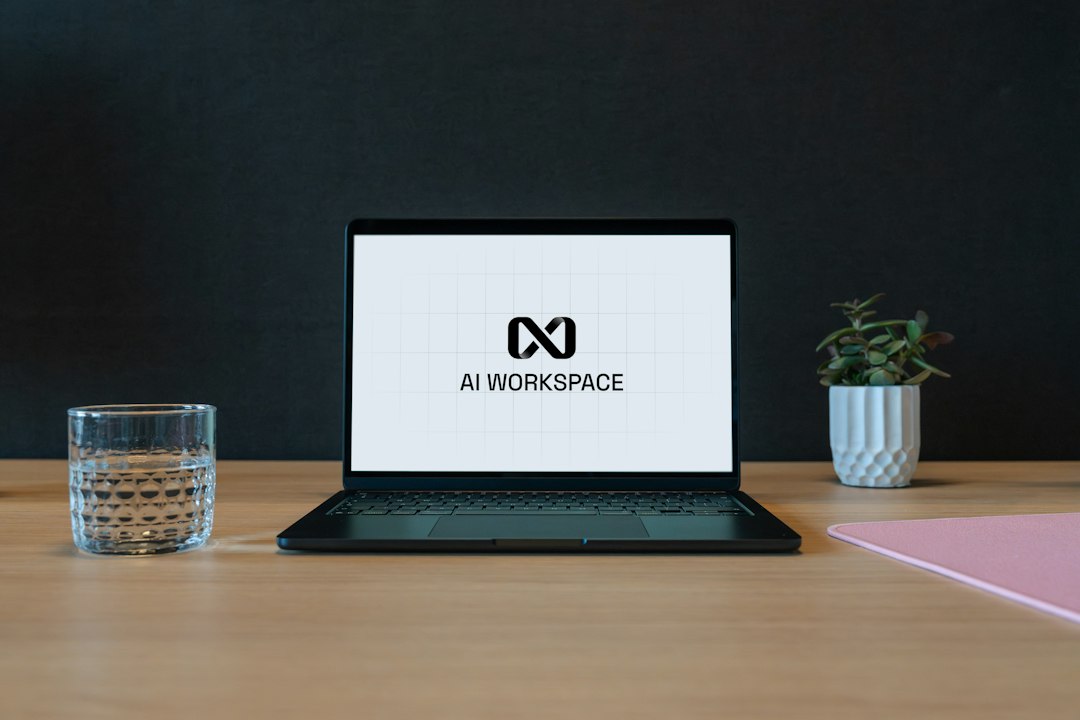 Person using a laptop for AI-driven business tools