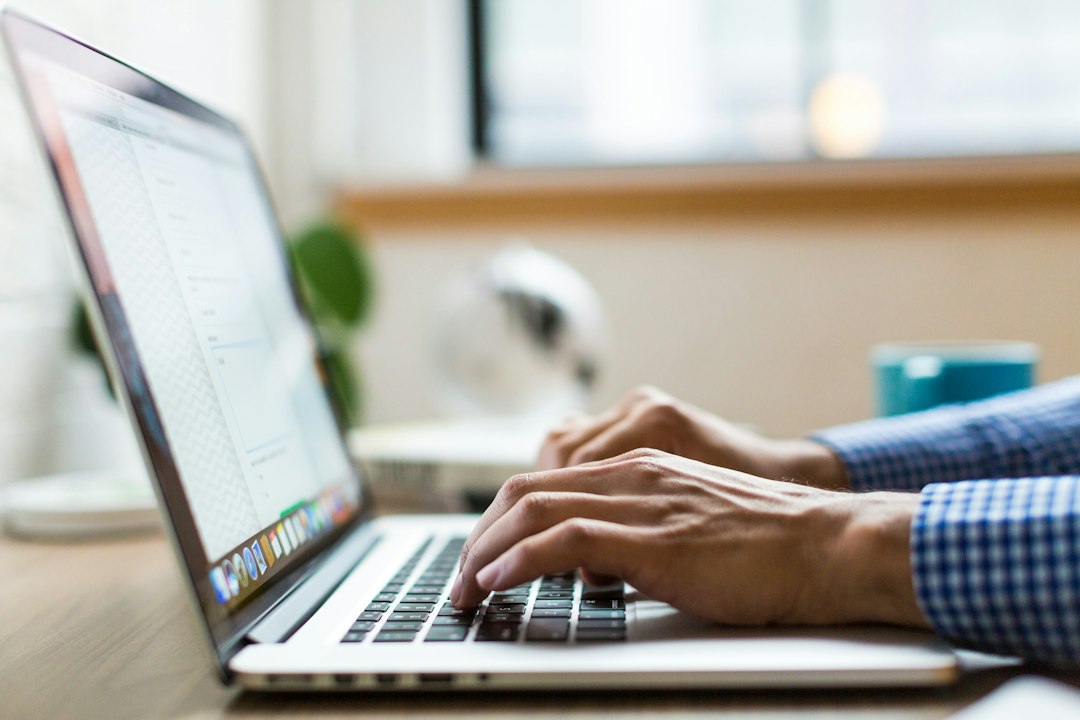 Professional using a laptop for business productivity